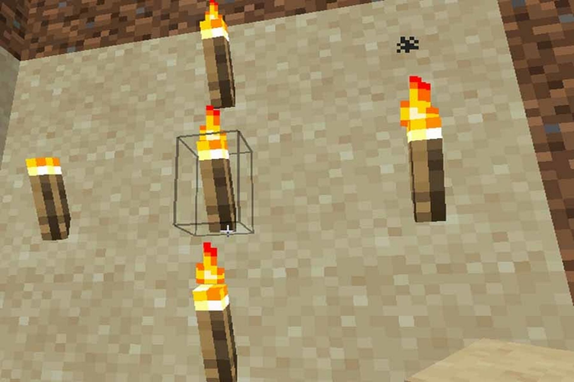 Correct spacing of torches can save a player&#039;s stock and keep mobs away (Image via Mojang)
