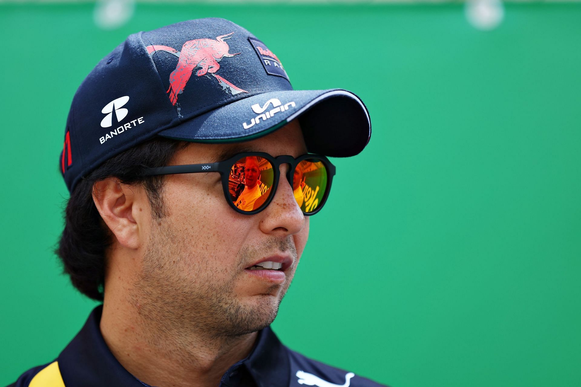 Sergio Perez looks on from the drivers parade ahead of the 2022 Moanco GP (Photo by Clive Rose/Getty Images)