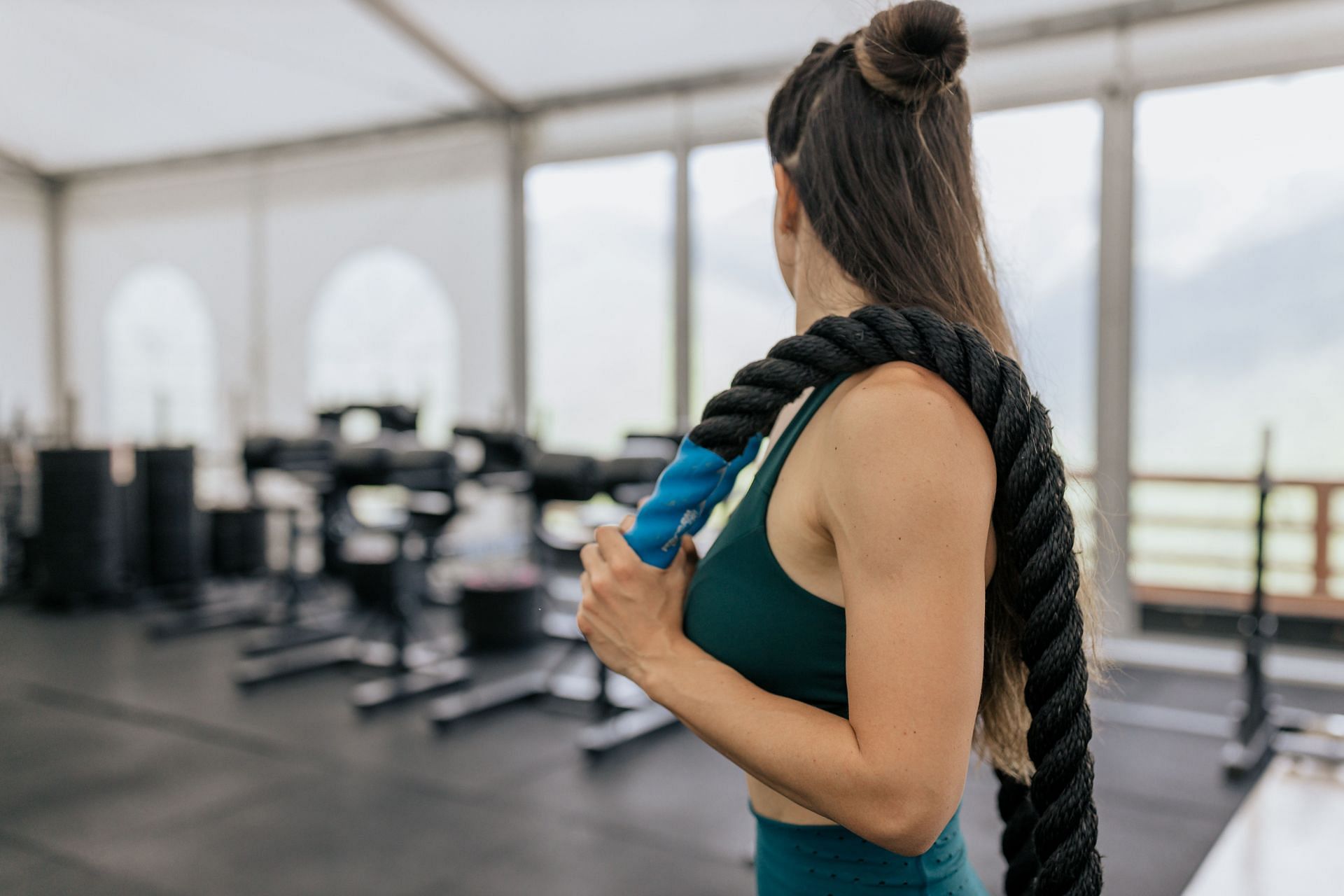 Battle ropes are used for high-intensity strength-building and calorie-burning (Image via Pexels/ Anastasia Shuraeva)