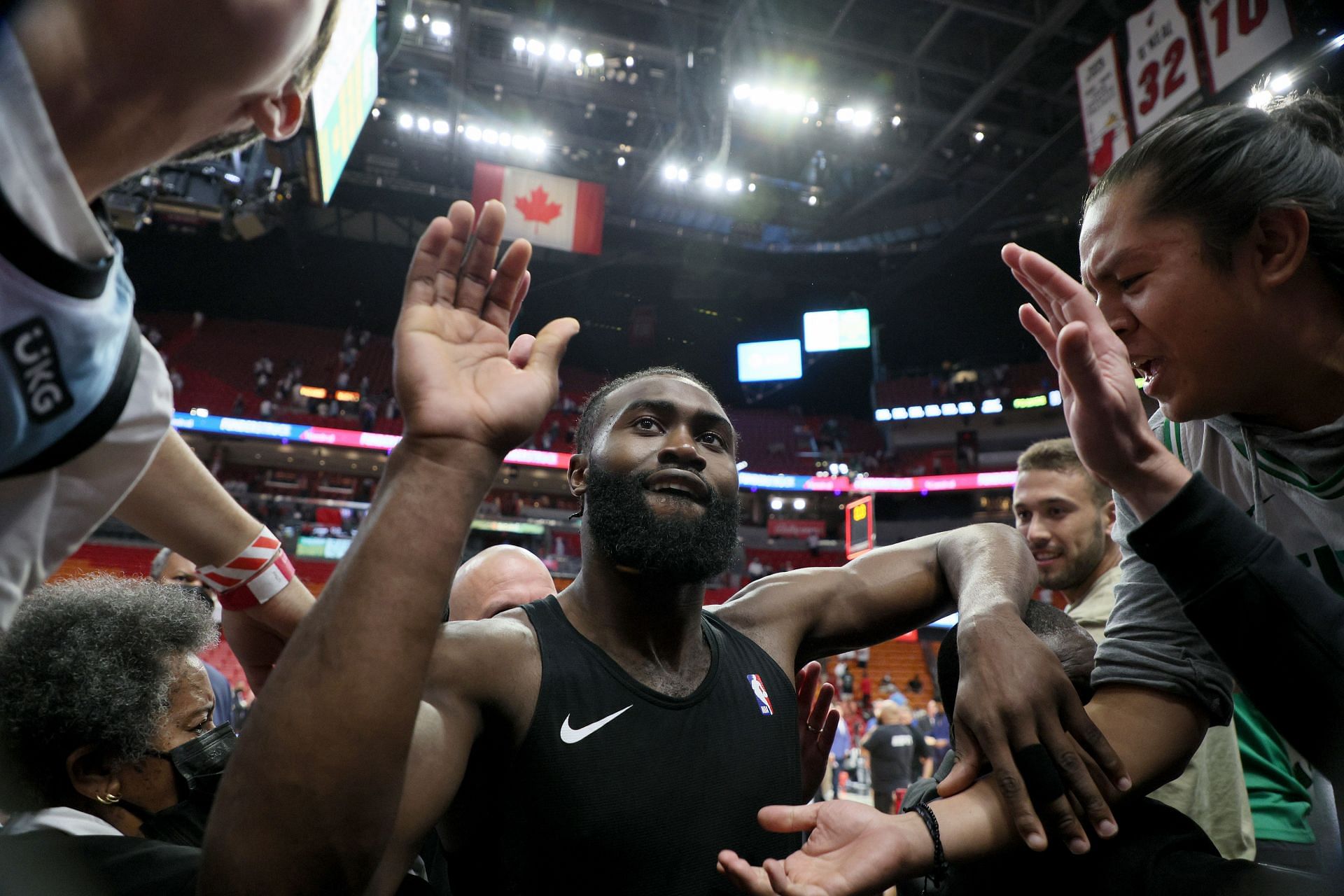 Jaylen Brown #7 of the Boston Celtics celebrates with fans after defeating the Miami Heat in Game Five of the 2022 NBA Playoffs Eastern Conference Finals at FTX Arena on May 25, 2022 in Miami, Florida.