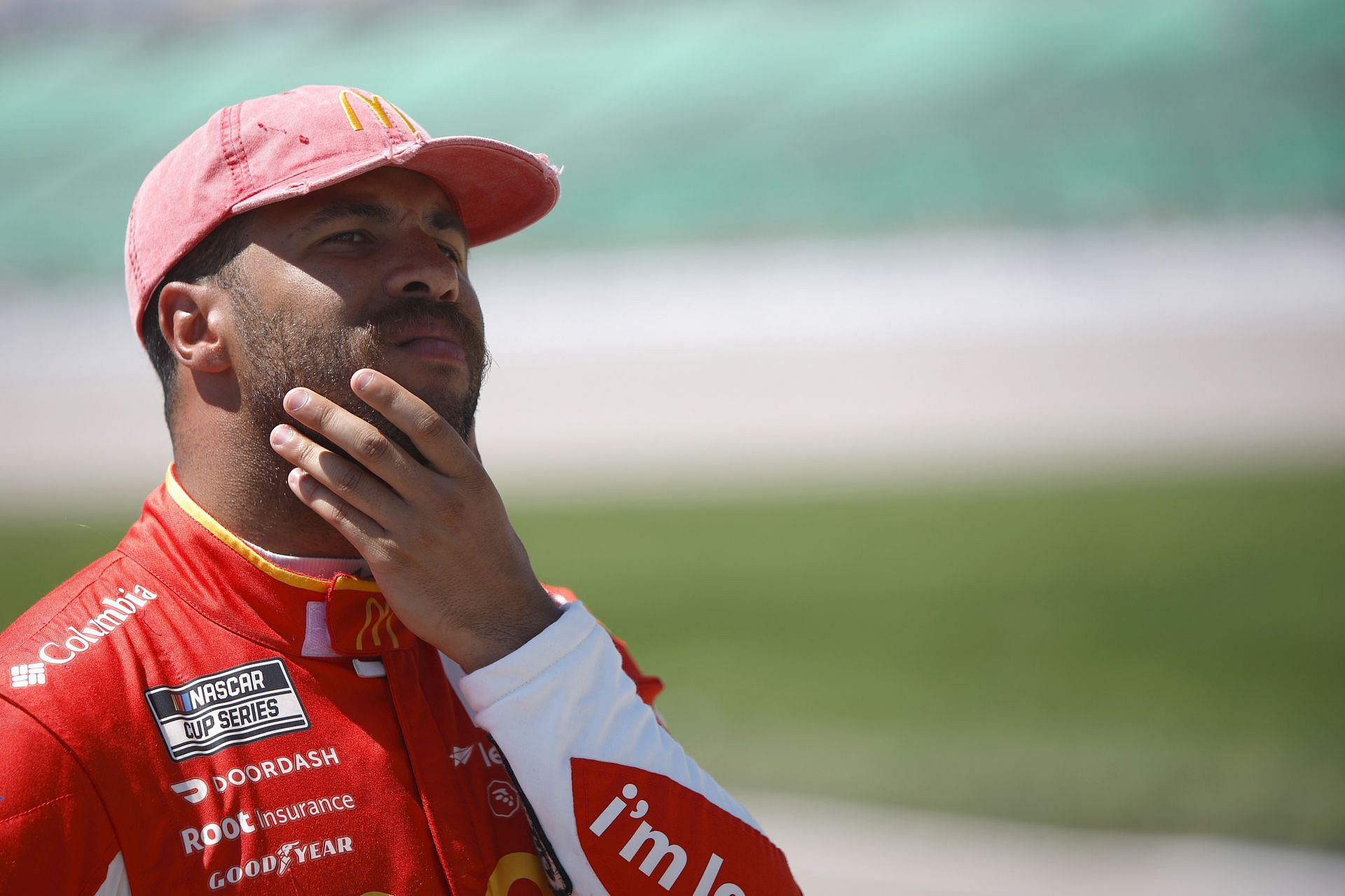 Bubba Wallace Jr. looks on during qualifying for the NASCAR Camping World Truck Series Heart of America 200 at Kansas Speedway