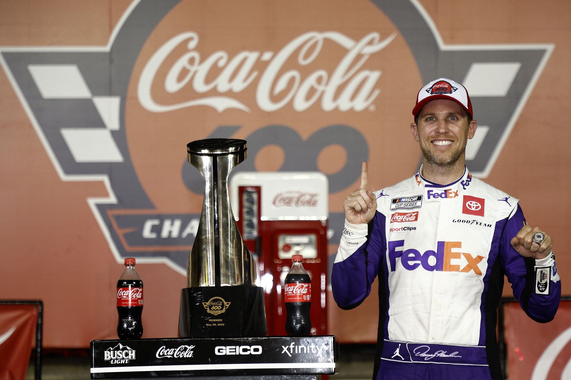 Denny Hamlin celebrates in Victory Lane after winning the NASCAR Cup Series Coca-Cola 600 at Charlotte Motor Speedway (Photo by Jared C. Tilton/Getty Images)