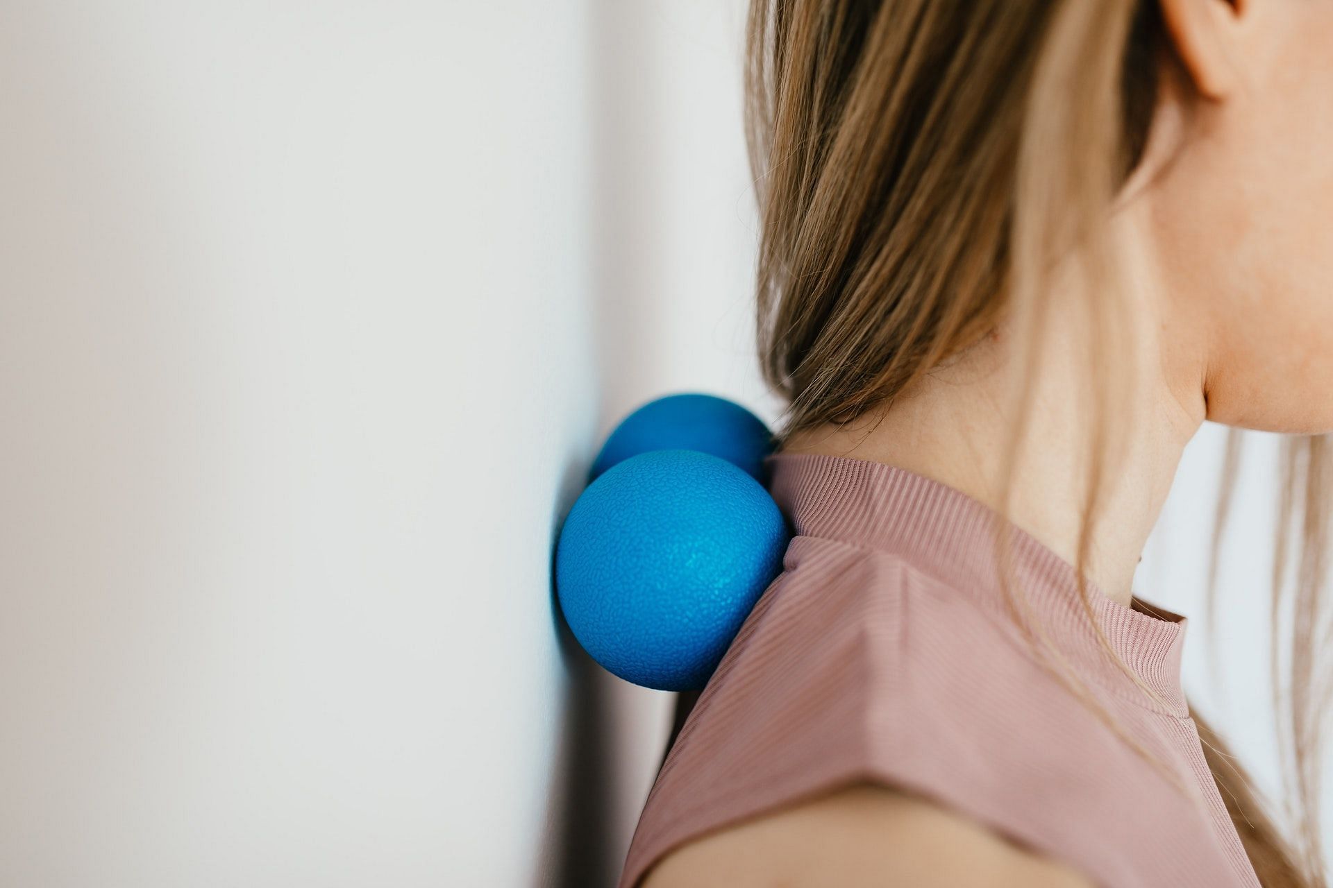 Effective exercises to ease neck pain.  Image credits: (Pexels/ Karolina Grabowska)