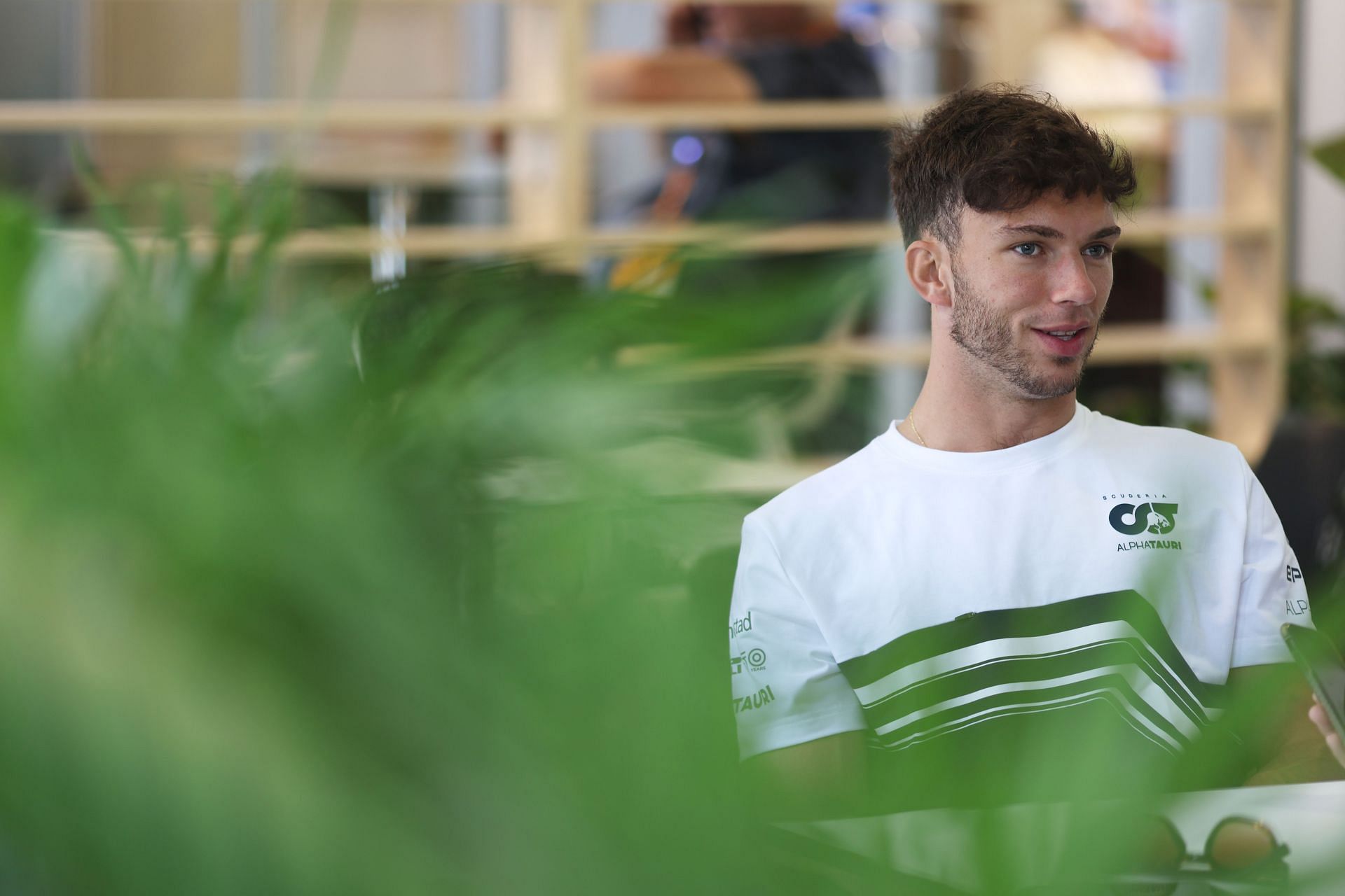 Pierre Gasly talks to the media in the Paddock during previews ahead of the F1 Grand Prix of Miami at the Miami International Autodrome on May 05, 2022 in Miami, Florida. (Photo by Peter Fox/Getty Images)