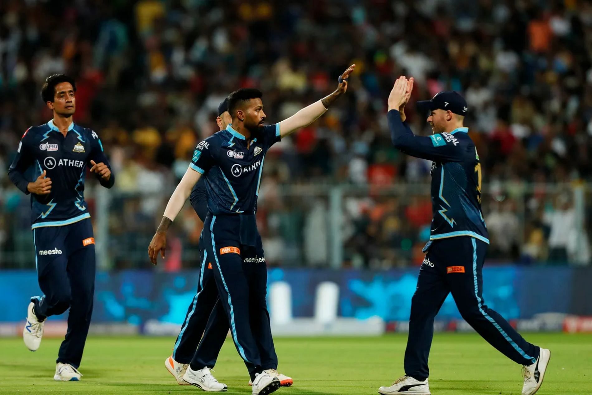 Gujarat Titans players celebrate a wicket. All Pics: IPLT20.COM