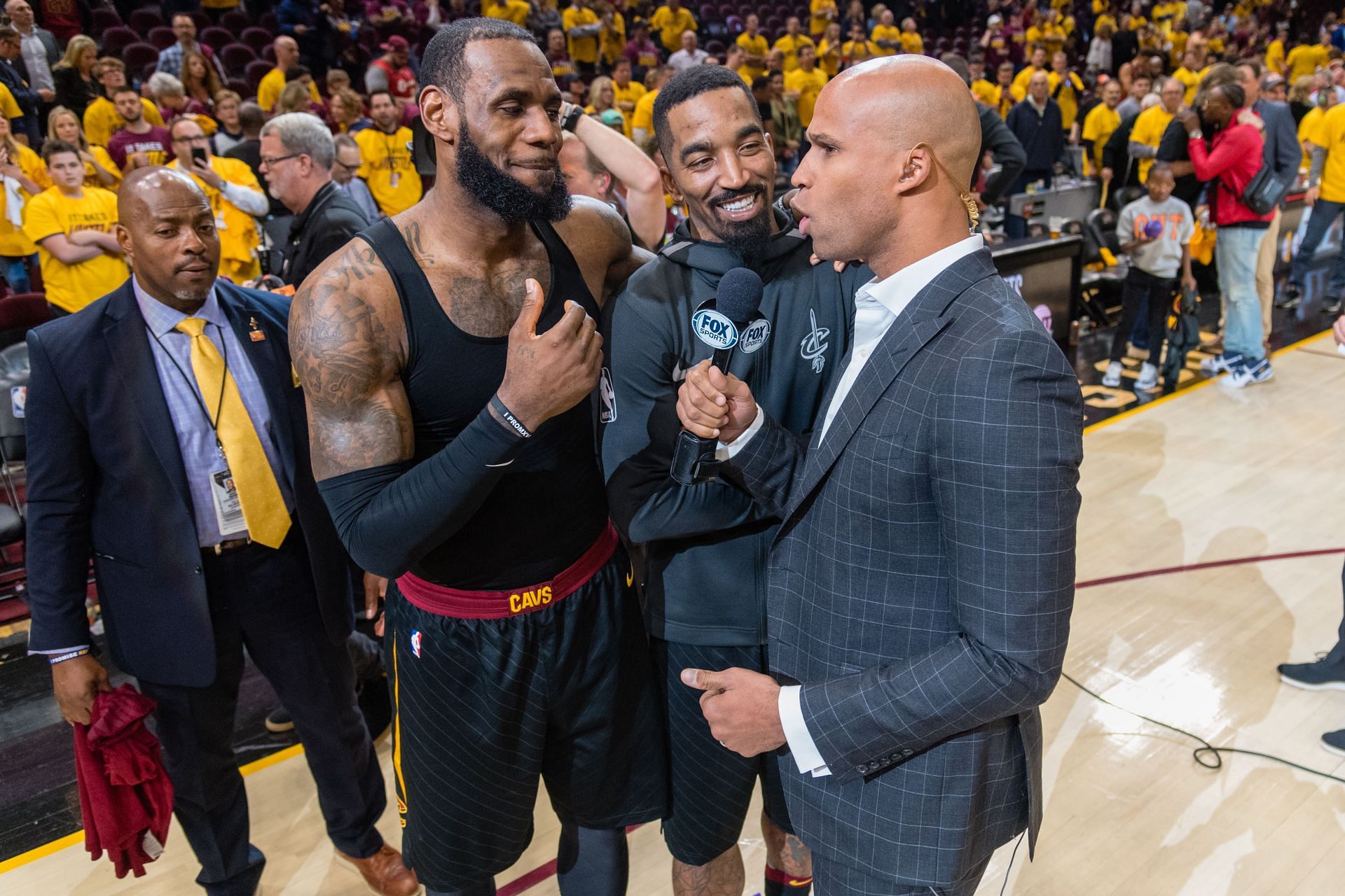 LeBron James of the Cleveland Cavaliers talks with former teammate Richard Jefferson in 2018.