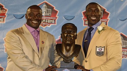 Sterling Sharpe (r) with his brother Shannon Shannon (l) at his HOF ceremony in 2011. Source: USA Today