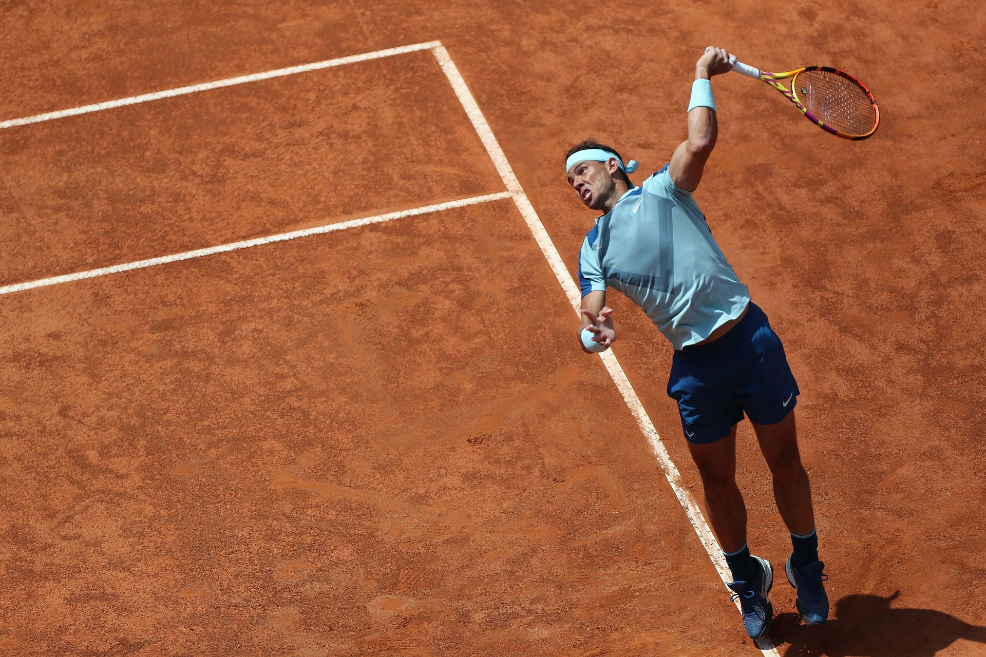 Rafael Nadal in action against John Isner in Rome