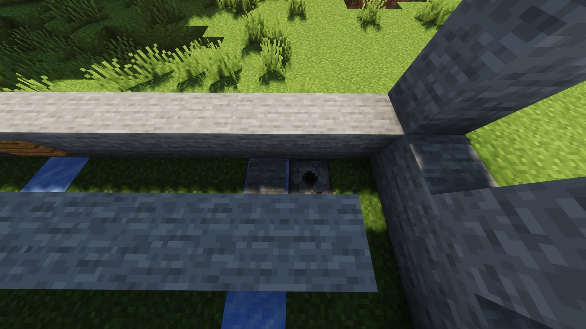 Place a dispenser next to a pressure plate (Image via Minecraft)