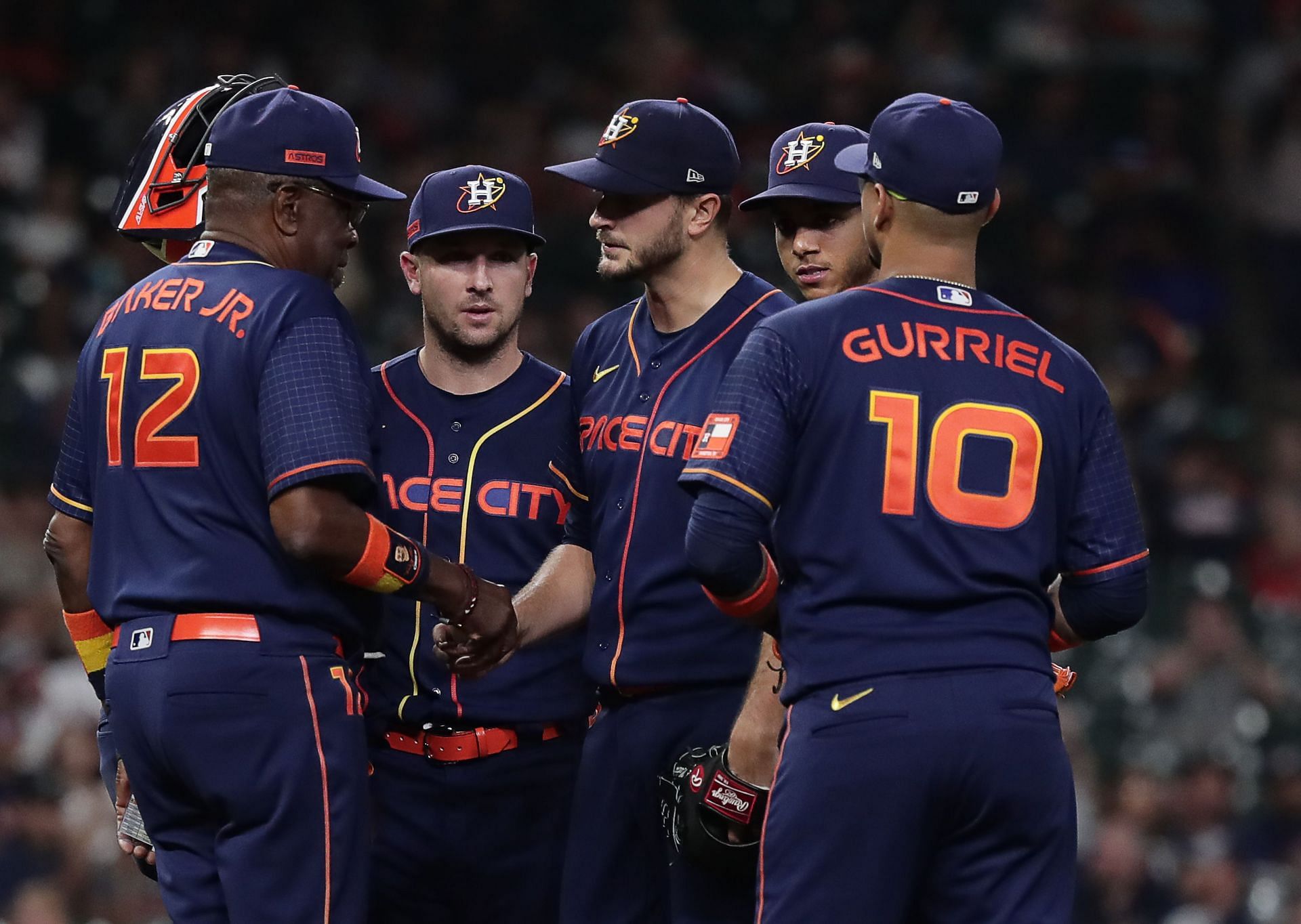 The Astros gather together during a game against the Seattle Mariners.