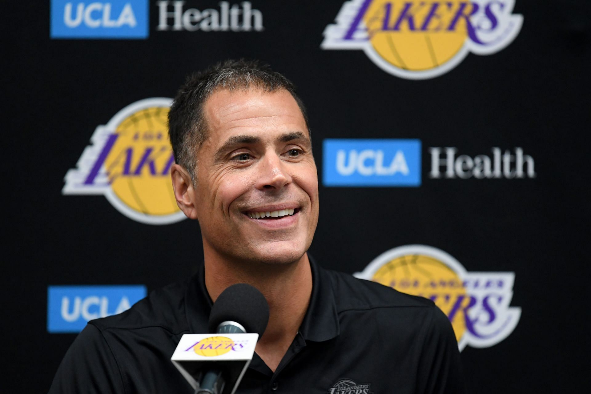 LA Lakers general manager Rob Pelinka smiles as he speaks to the press during media day at the UCLA Health Training Center on Sept. 27, 2019, in El Segundo, California