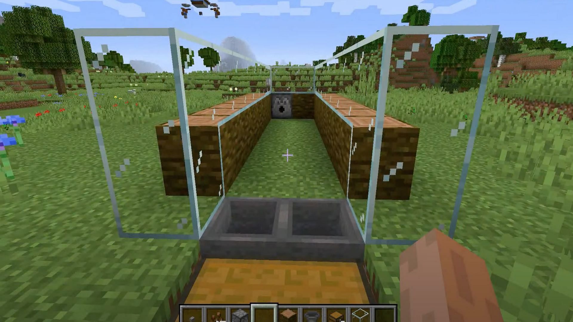 Players can replace the first logs with glass blocks for a nicer look (Image via NaMiature/YouTube)