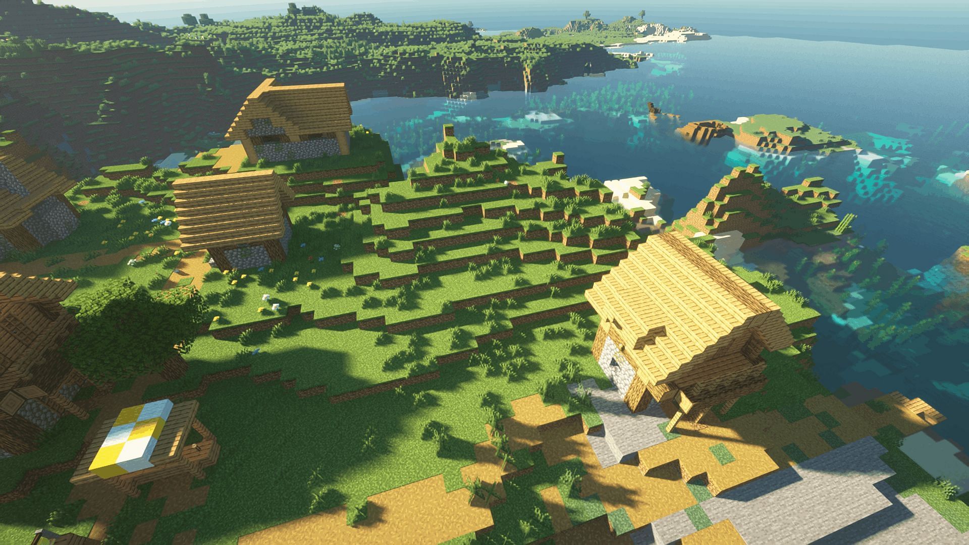 A coastal village with the SEUS shader (Image via Minecraft)