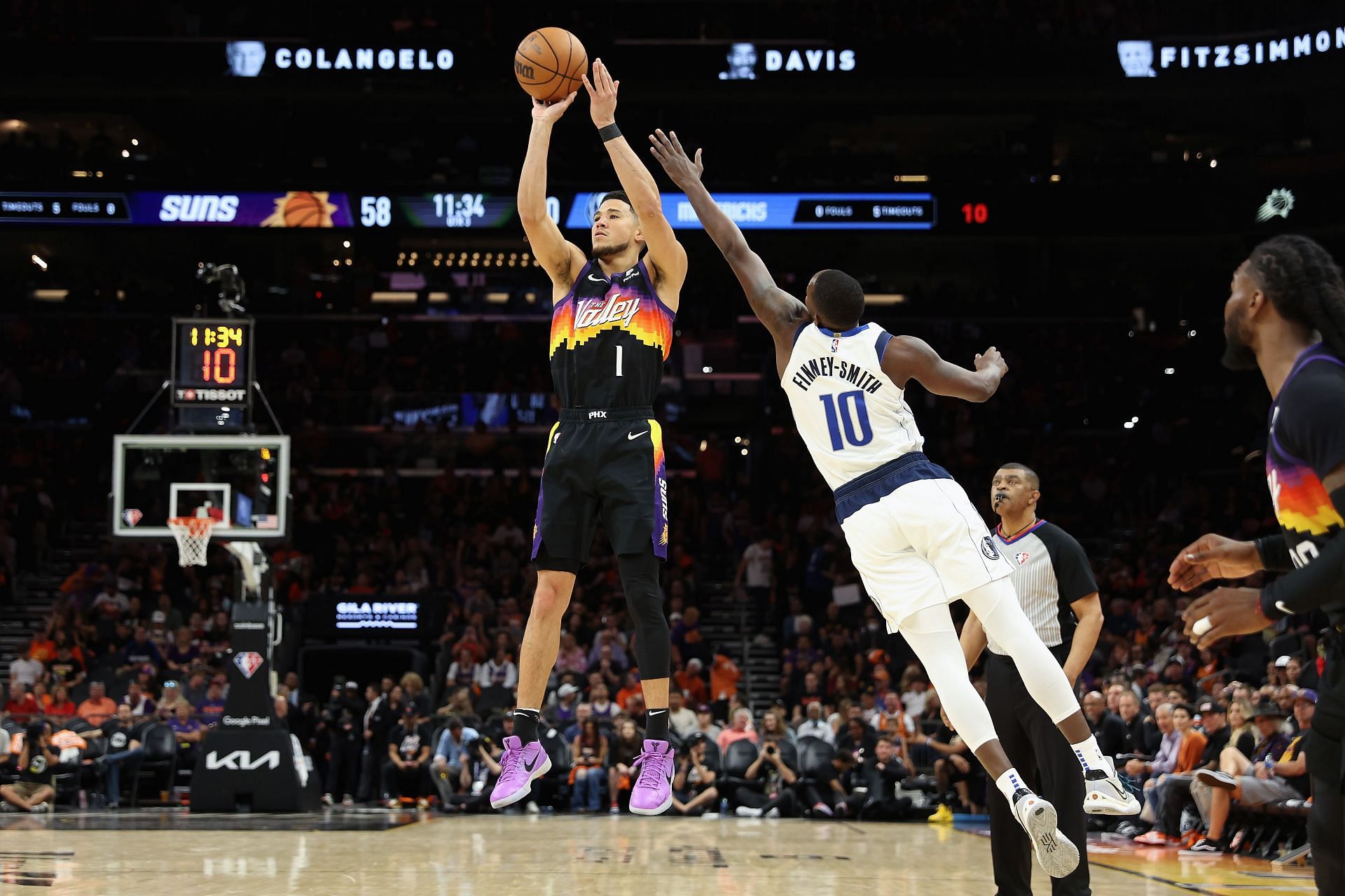 Finney-Smith contesting a shot by Devin Booker in Game Two