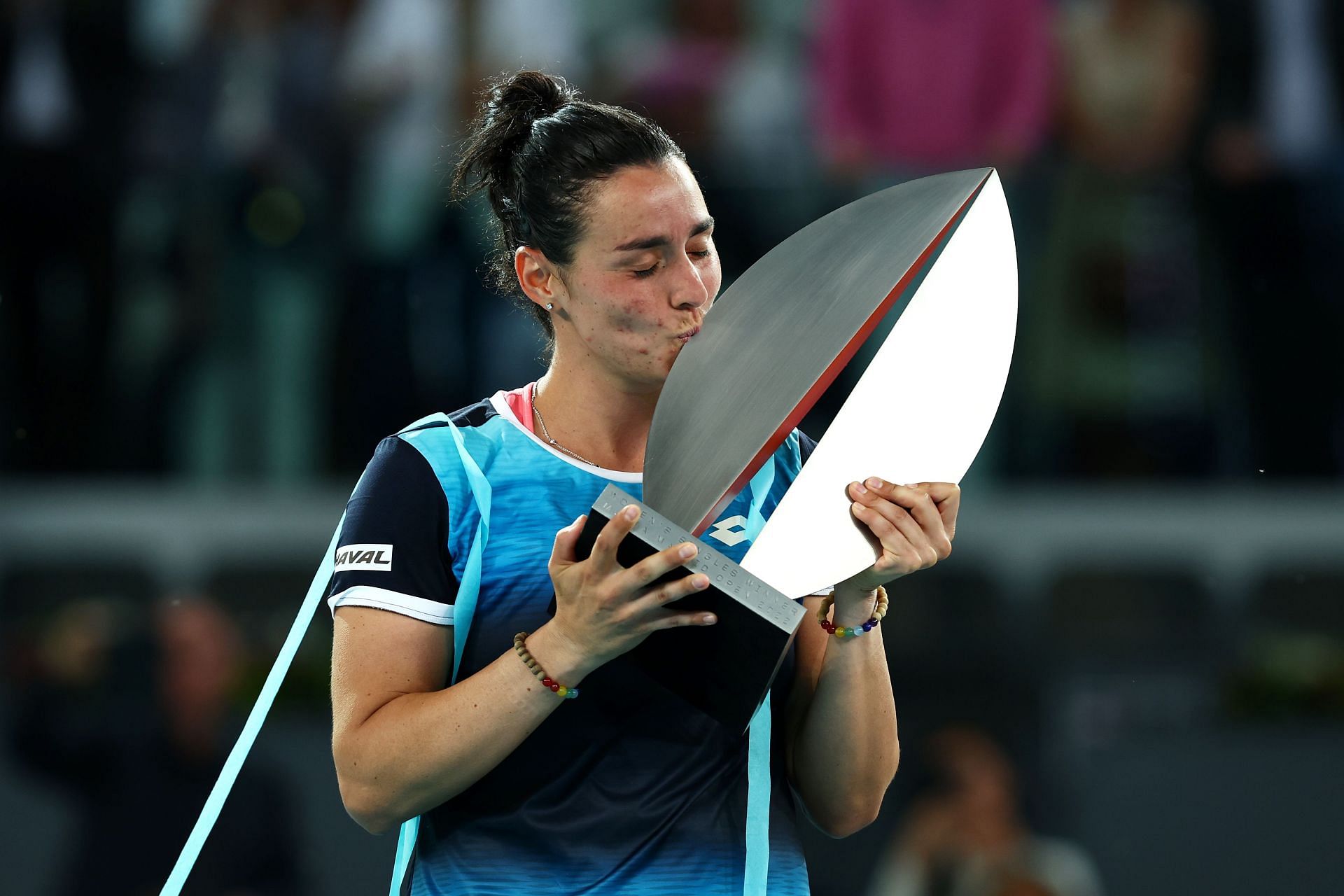 Jabeur kisses the Madrid Open trophy