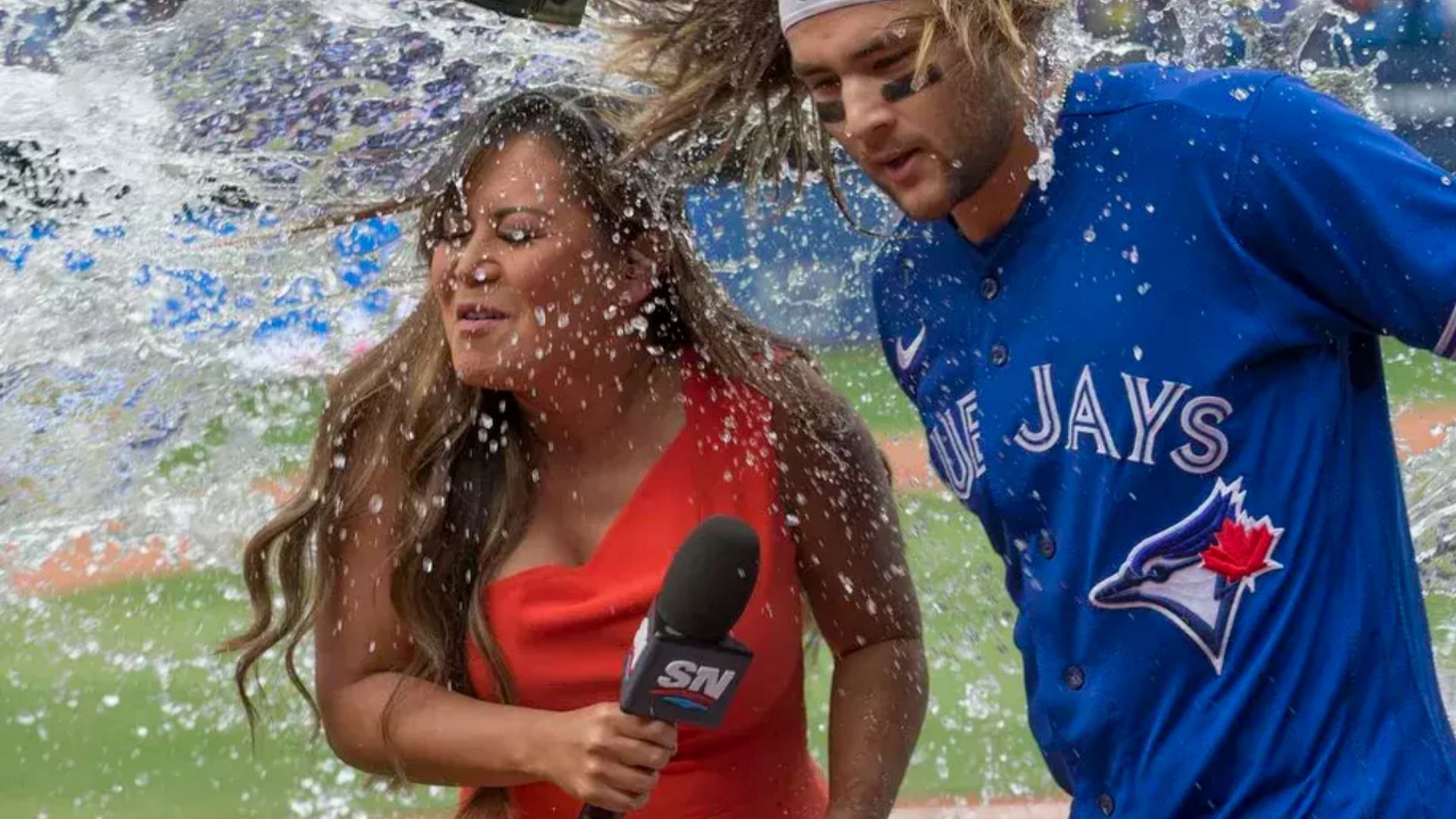 MLB Network host Hazel Mae in a Gatorade shower prank aimed at Toronto Blue Jays&#039; Bo Bichette.