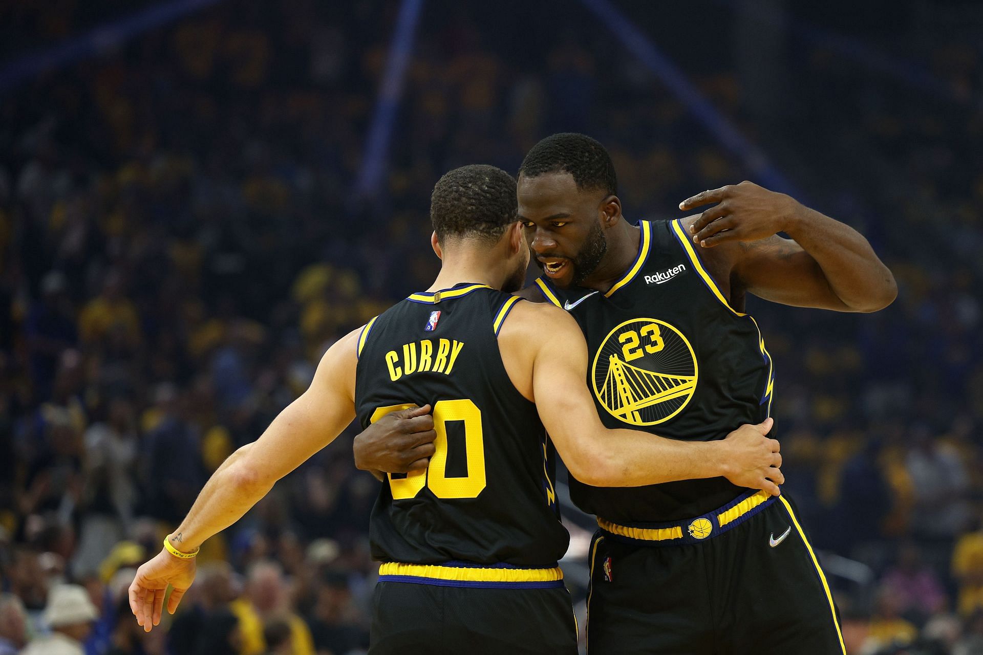 Steph Curry celebrates a play with Draymond Green