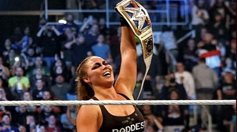Ronda Rousey captured the WWE Smackdown Women&#039;s title by forcing Charlotte to say, &quot;I Quit&quot;