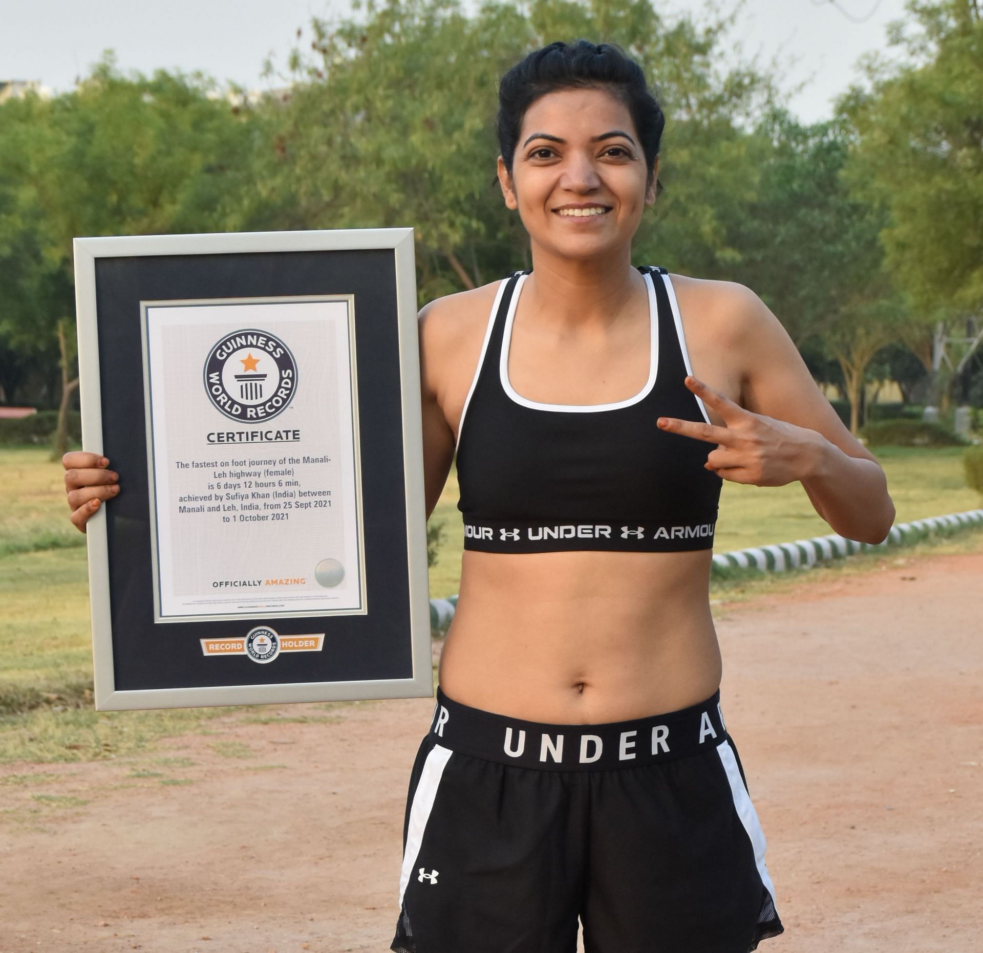 Ultra-runner Sufiya with her Guinness Book of World Records certificate.