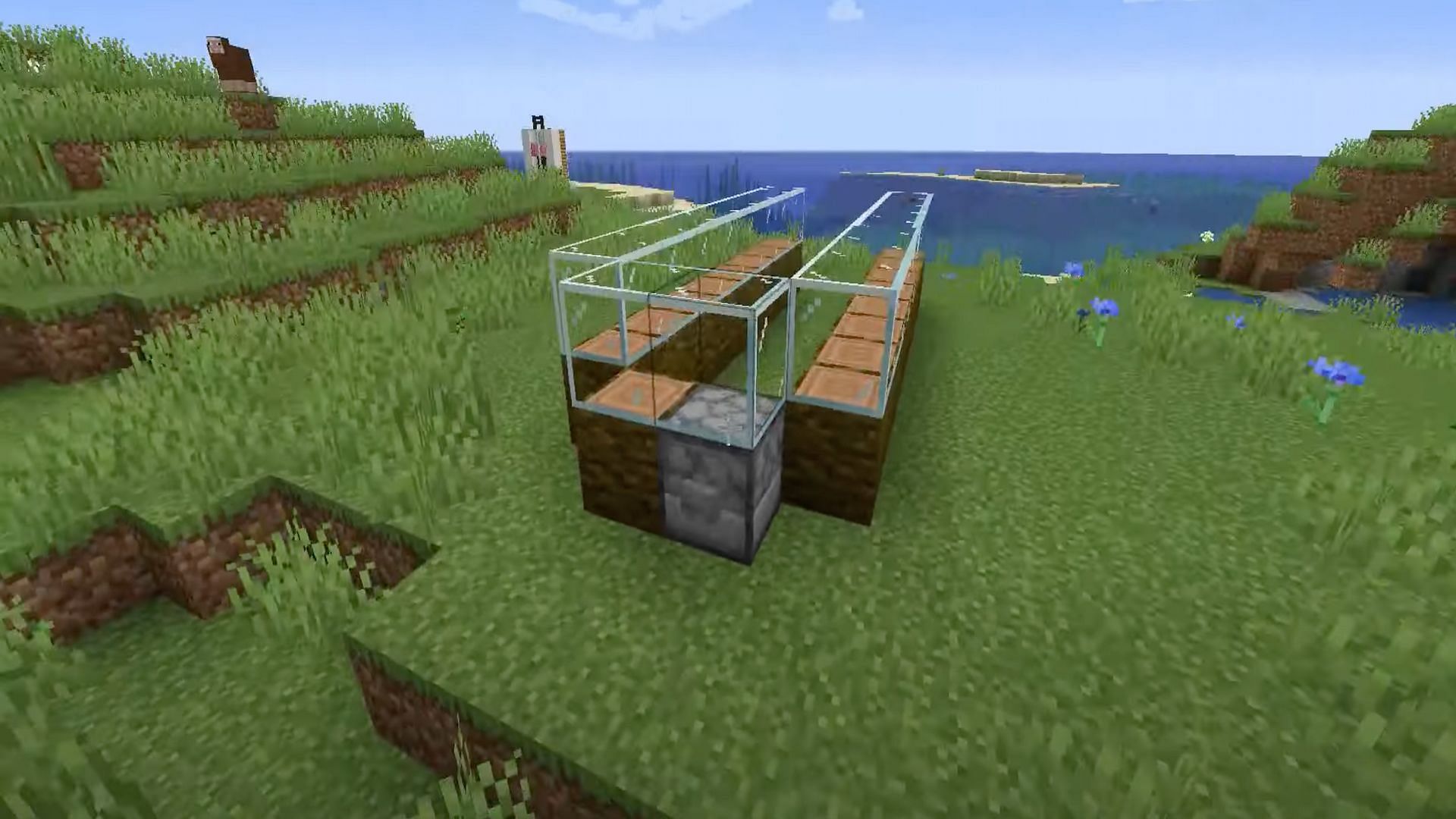 Minecraft players need to place a button on the dispenser (Image via NaMiature/YouTube)