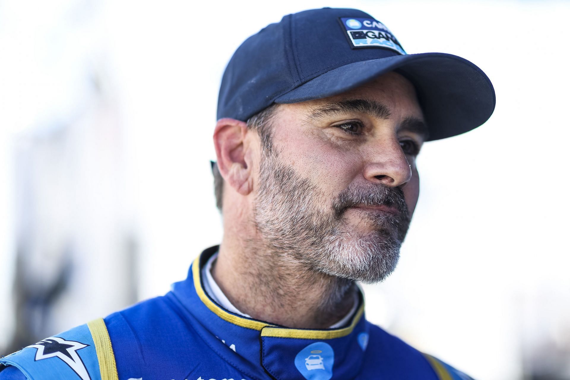 Jimmie Johnson looks on during practice for the NTT IndyCar Series XPEL 375 at Texas Motor Speedway (Photo by James Gilbert/Getty Images)