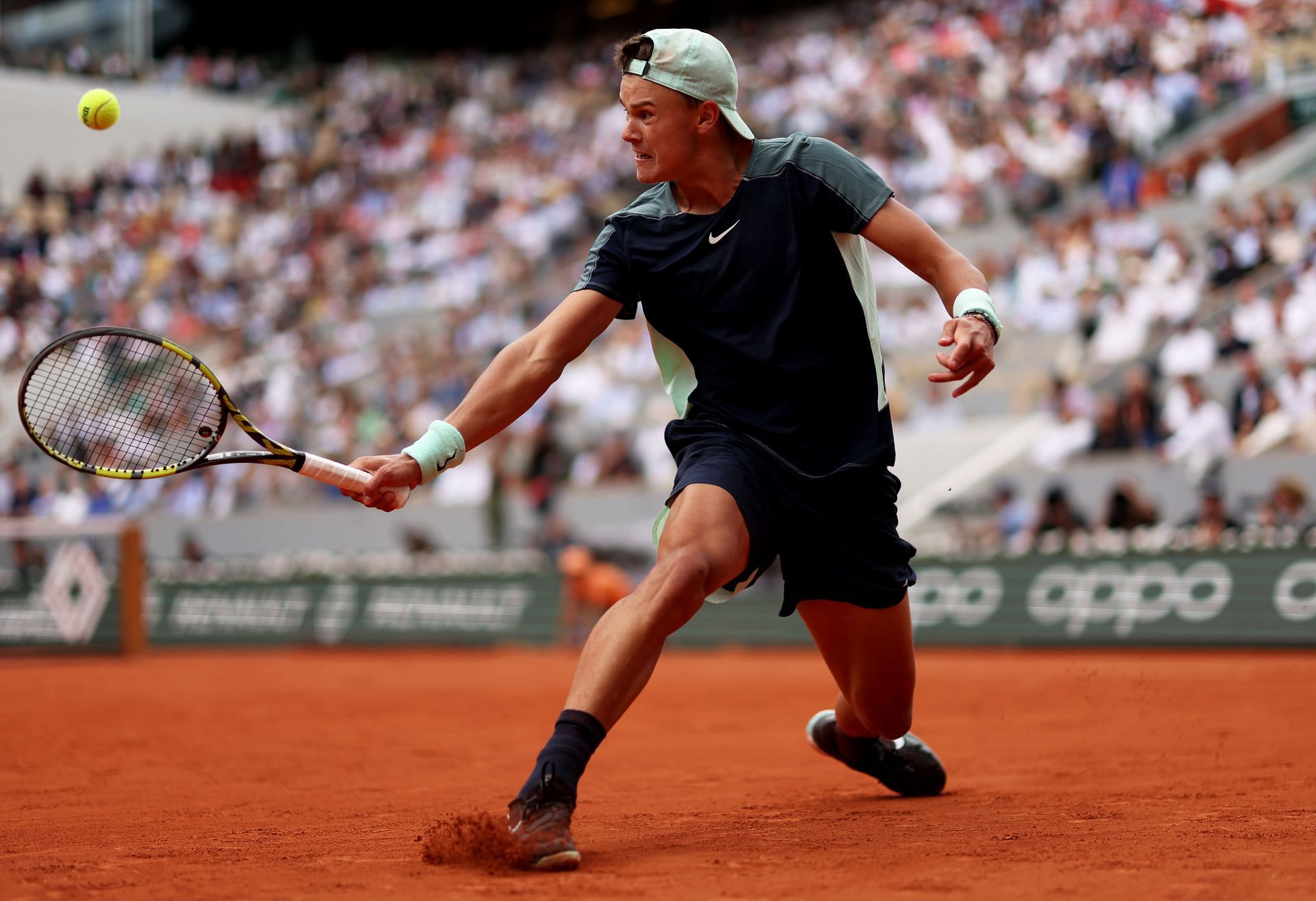 Rune in action at the 2022 French Open - Day Nine