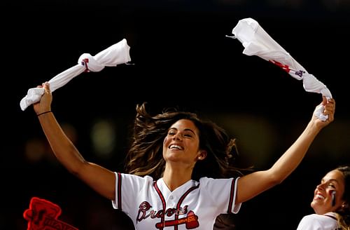 The Atlanta Braves "Tomahawk Team" cheerleads and throws shirts to fans during games.