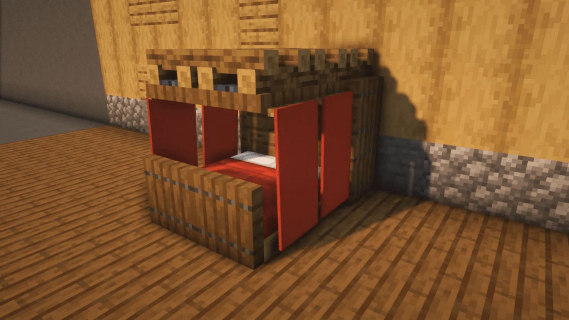 For users who like curtains on their bed, this build uses banners to do so (Image via TinyCraft/YouTube)