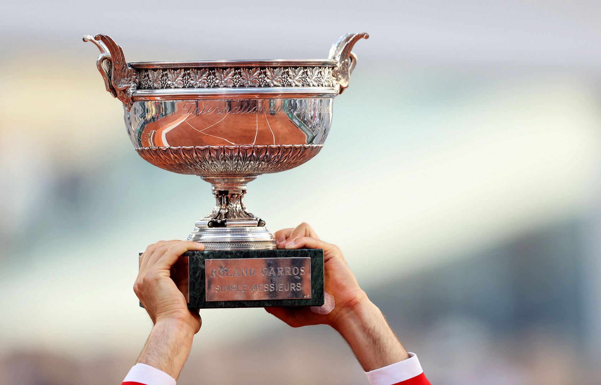 La Coupe des Mousquetaires held aloft at the 2021 French Open