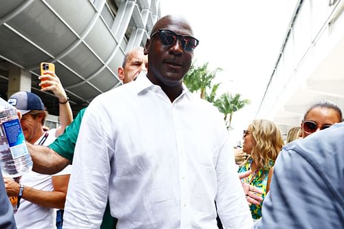 Basketball legend Michael Jordan walks in the Paddock before the F1 Grand Prix of Miami