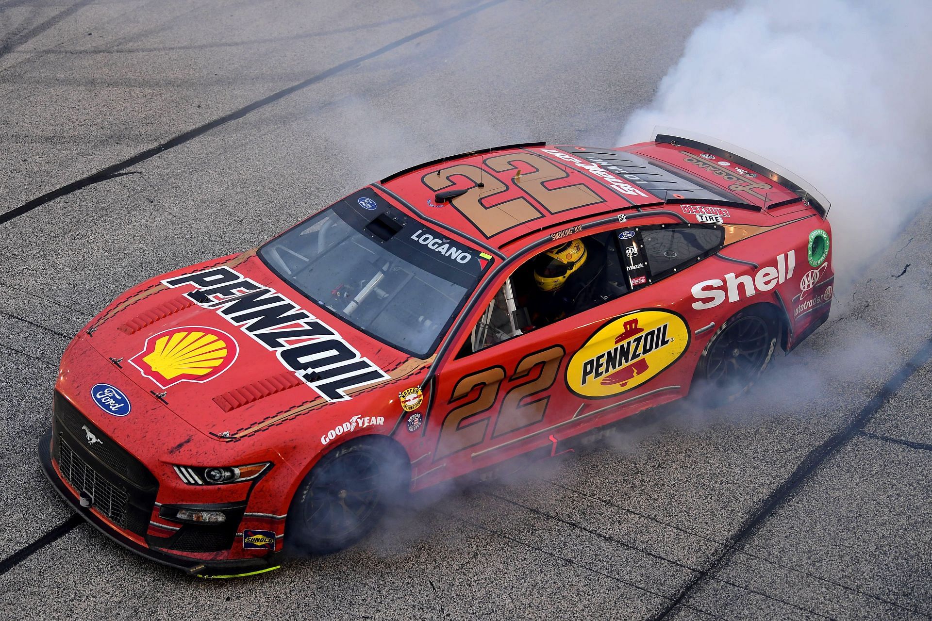 Joey Logano celebrates with a burnout after winning the 2022 NASCAR Cup Series Goodyear 400 at Darlington Raceway in Darlington, South Carolina. (Photo by Emilee Chinn/Getty Images)