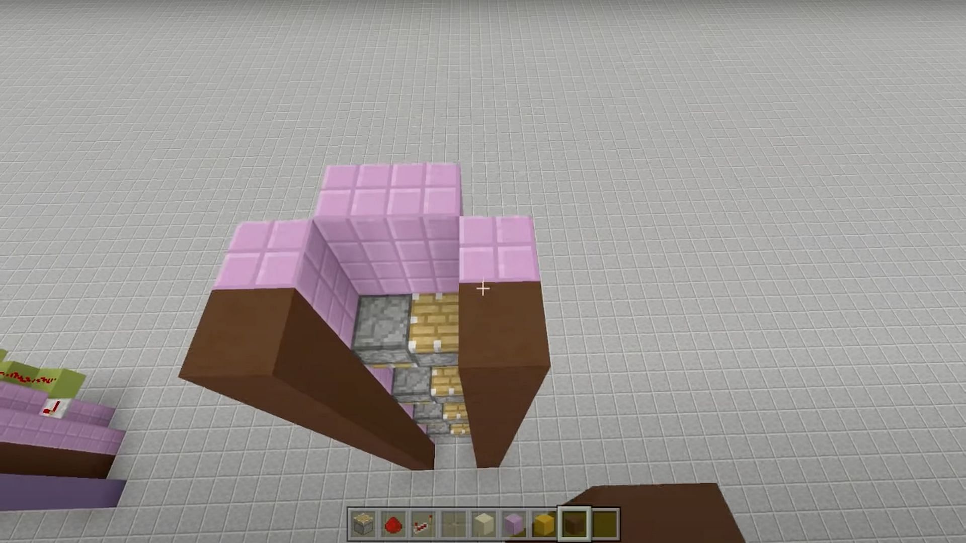 Players should add 2 columns of blocks on each side to form walls (Image via Fed X Gaming/YouTube)