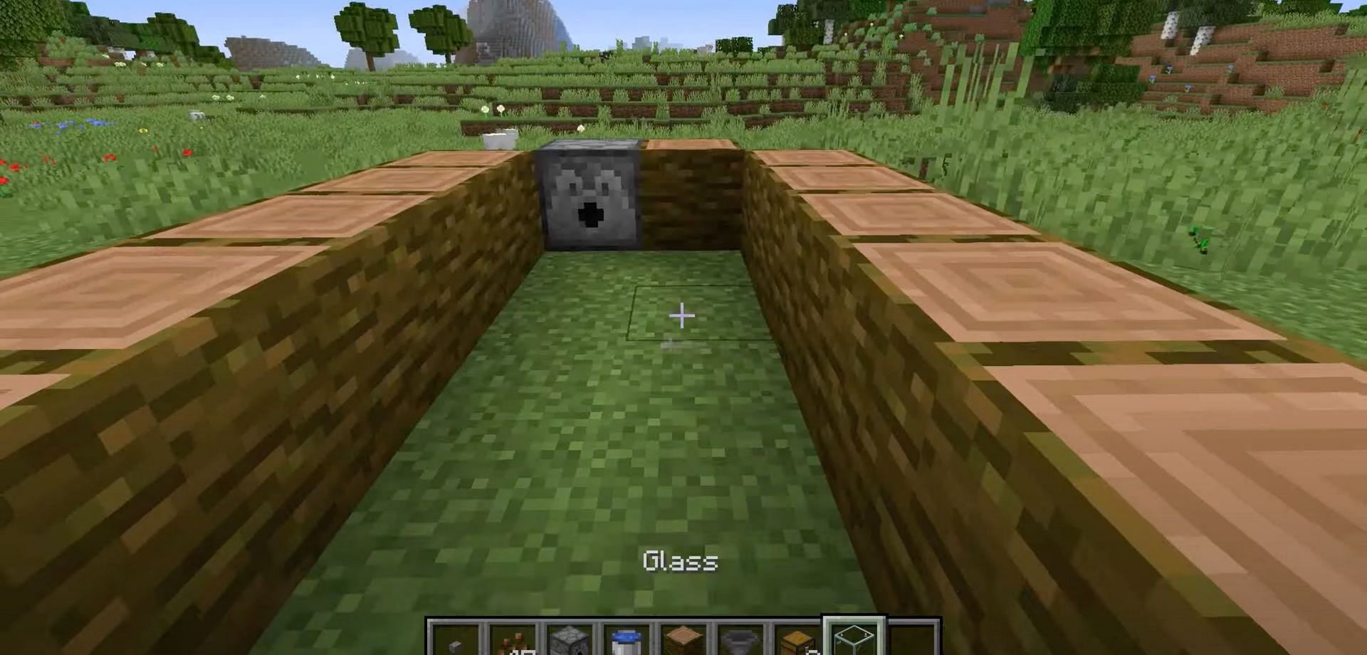 Place a dispenser next to a jungle log in between the rows (Image via NaMiature/YouTube)