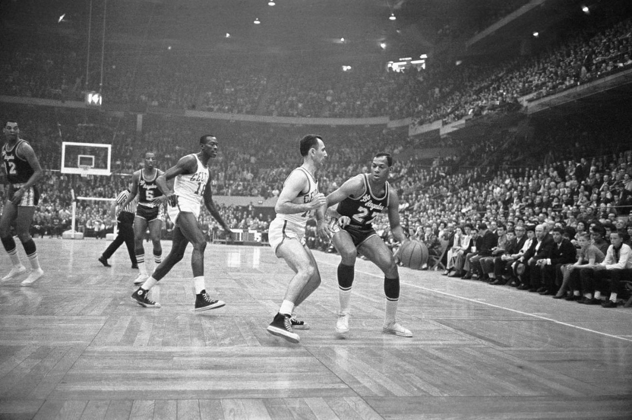 Bob Cousy [left] of the Boston Celtics guarding Elgin Baylor of the LA Lakers in a game in the 60s. [Photo: Lakers Daily]