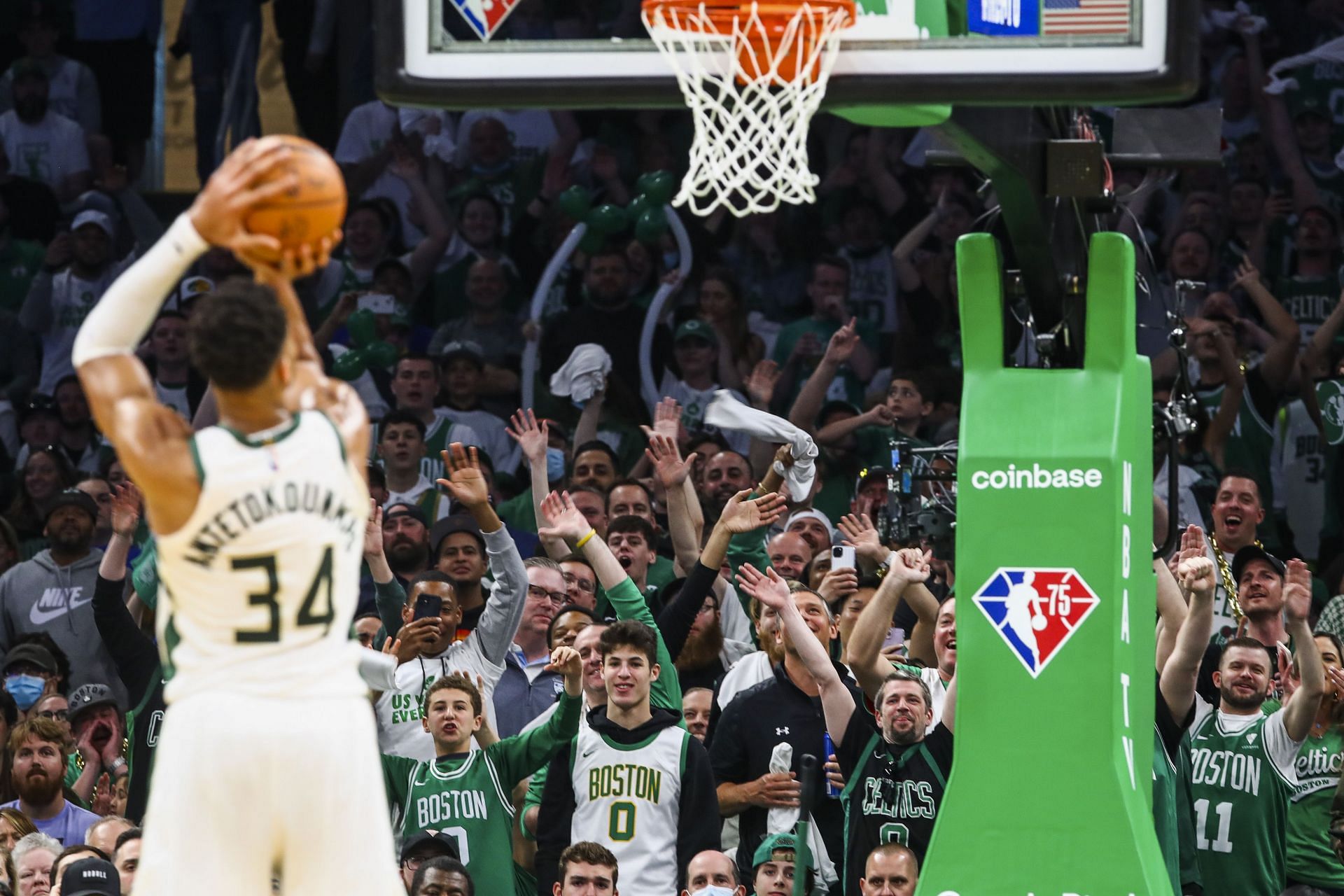 Boston Celtics fans try to distract Giannis Antetokounmpo of the Milwaukee Bucks