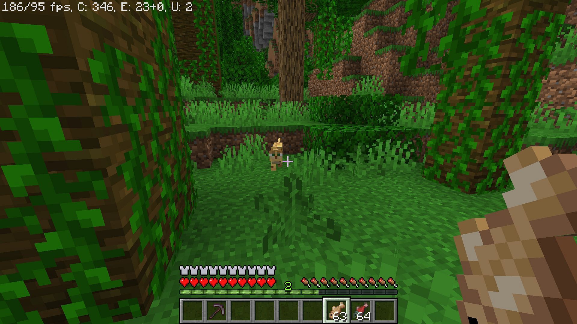 Lure them by holding raw fish and sneaking slowly (Image via Minecraft 1.18)
