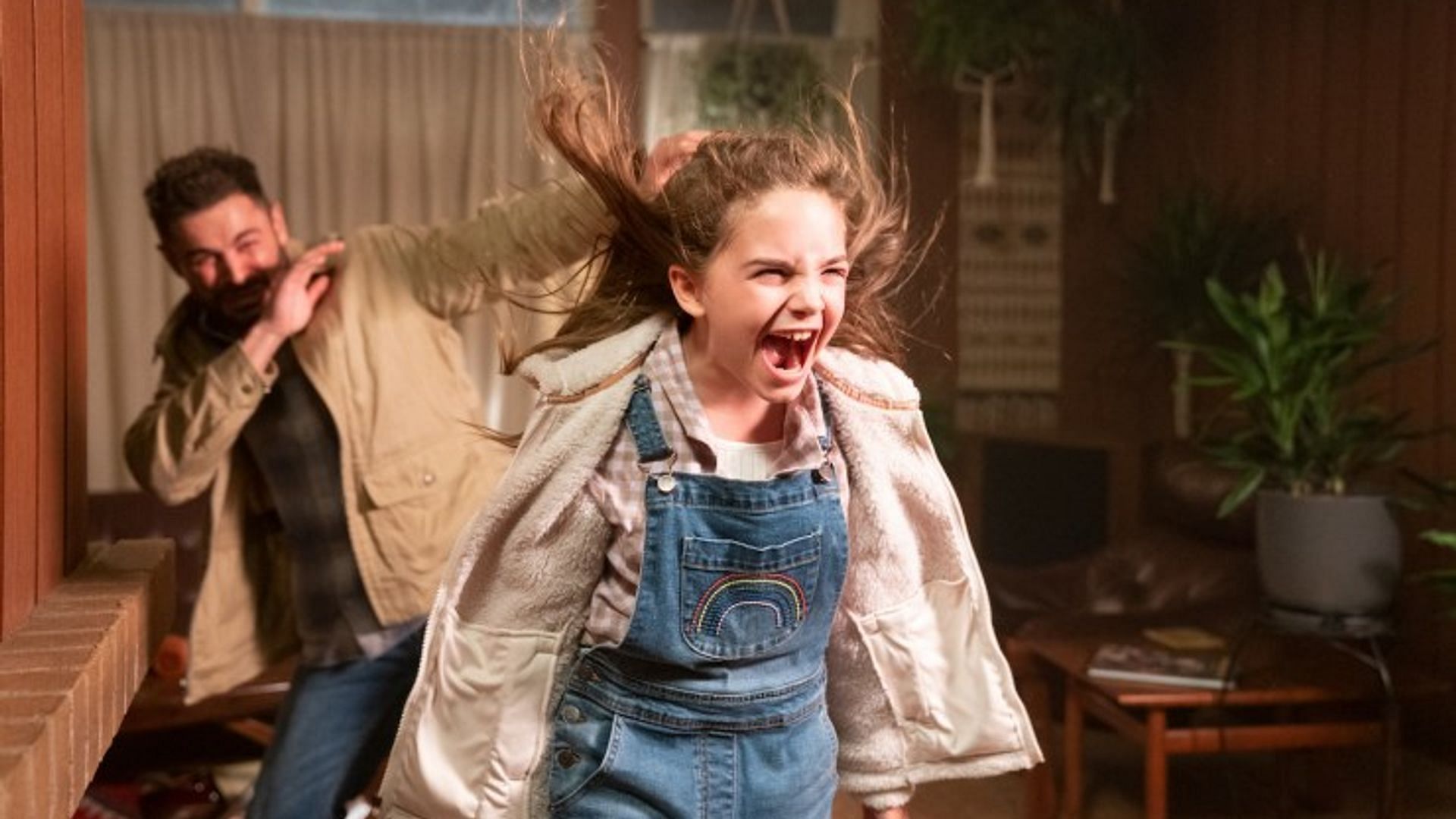 Still from Peacock&#039;s Firestarter starring Zac Efron and Ryan Kiera Armstrong (Image via Peacock)