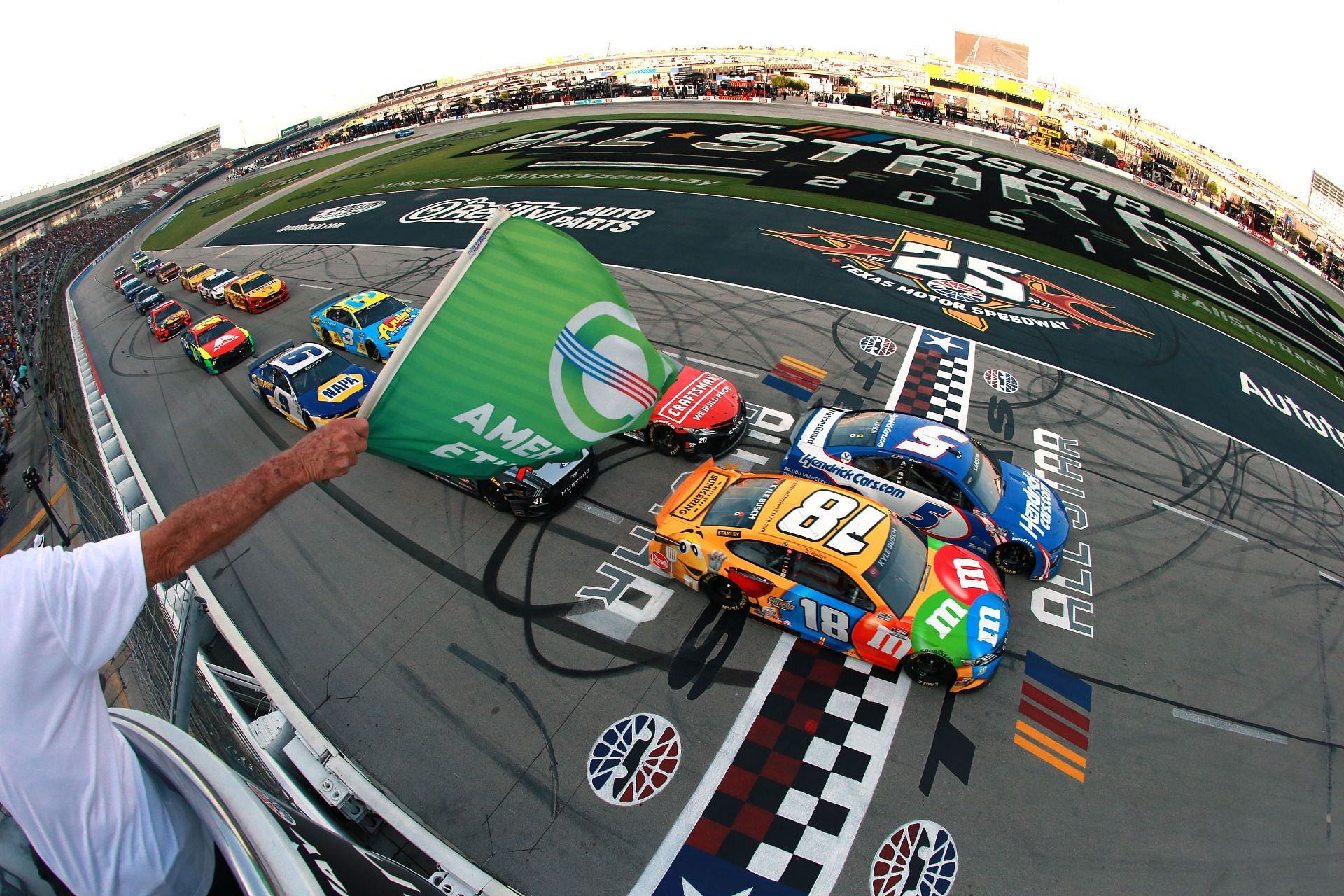 Kyle Busch and Kyle Larson lead the field to the green flag to start the 2021 NASCAR All-Star Race at Texas Motor Speedway in Fort Worth, Texas  (Photo by Sean Gardner/Getty Images)