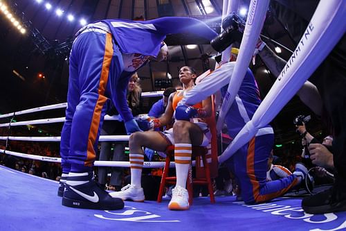 Amanda Serrano with cornerman and cutman in New York