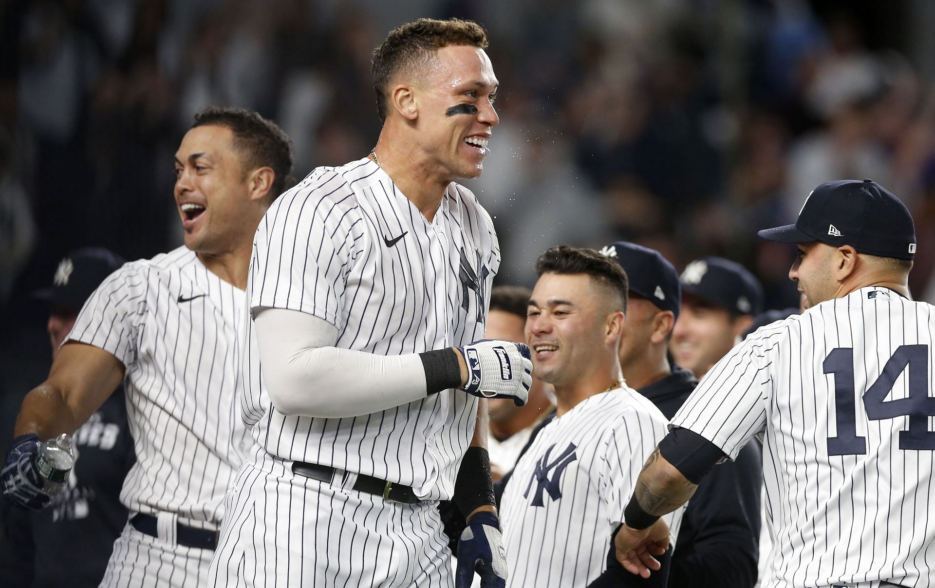 The Yankees celebrate after a come from behind walk-off home run by Aaron Judge against the Blue Jays in the ninth inning.