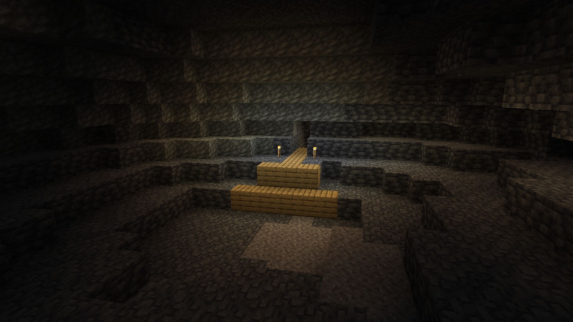 A secret base deep underground with a lava trap inside (Image via Minecraft)