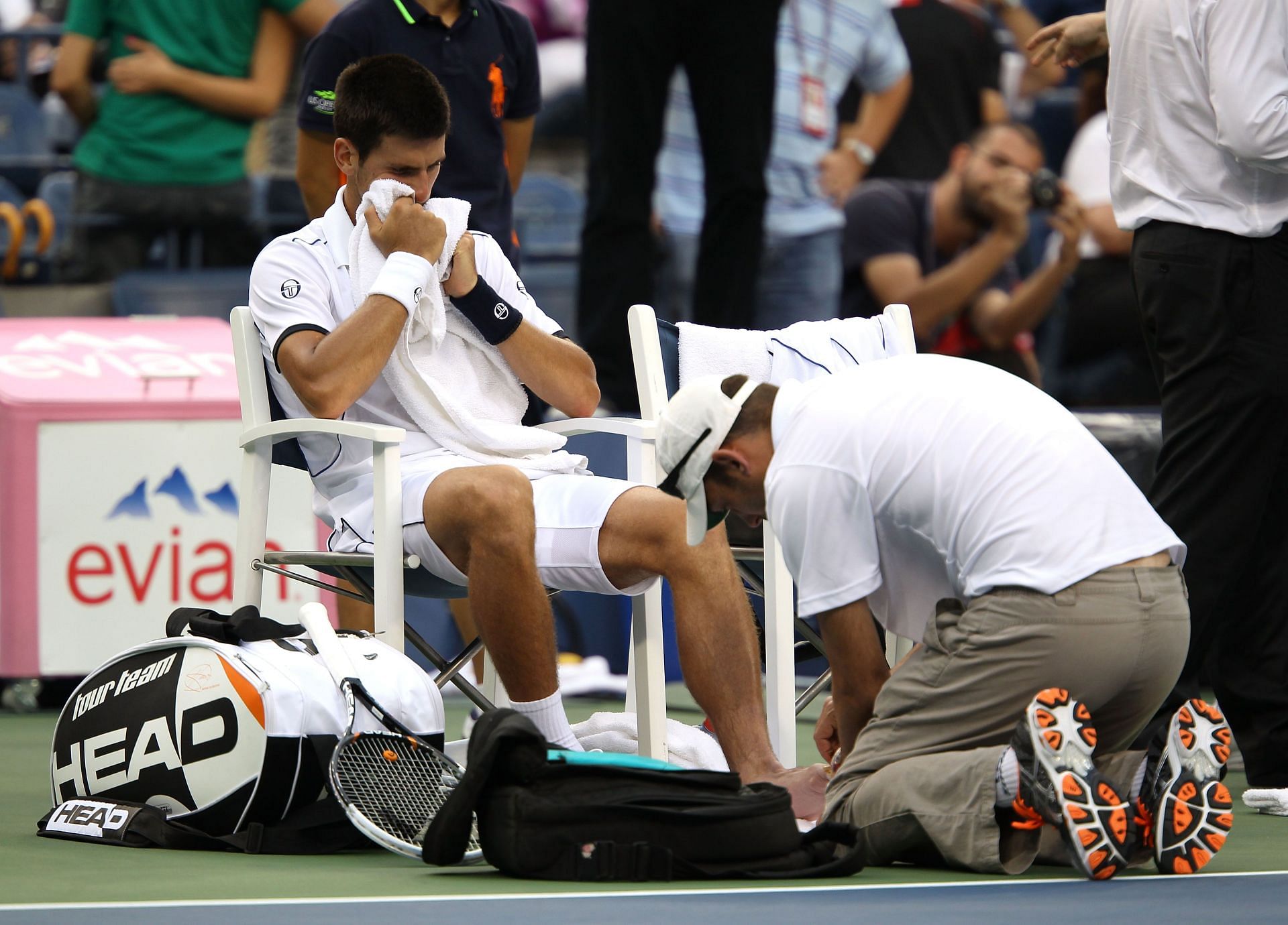 Novak Djokovic receives treatment at the 2011 US Open