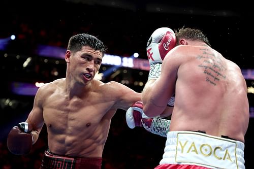 Dmitry Bivol (L) got a bit of a surprise during his fight introduction with Canelo Alvarez.