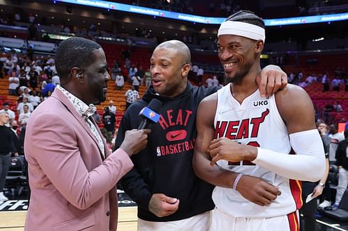 PJ Tucker and Jimmy Butler after the Philadelphia 76ers v Miami Heat - Game Five