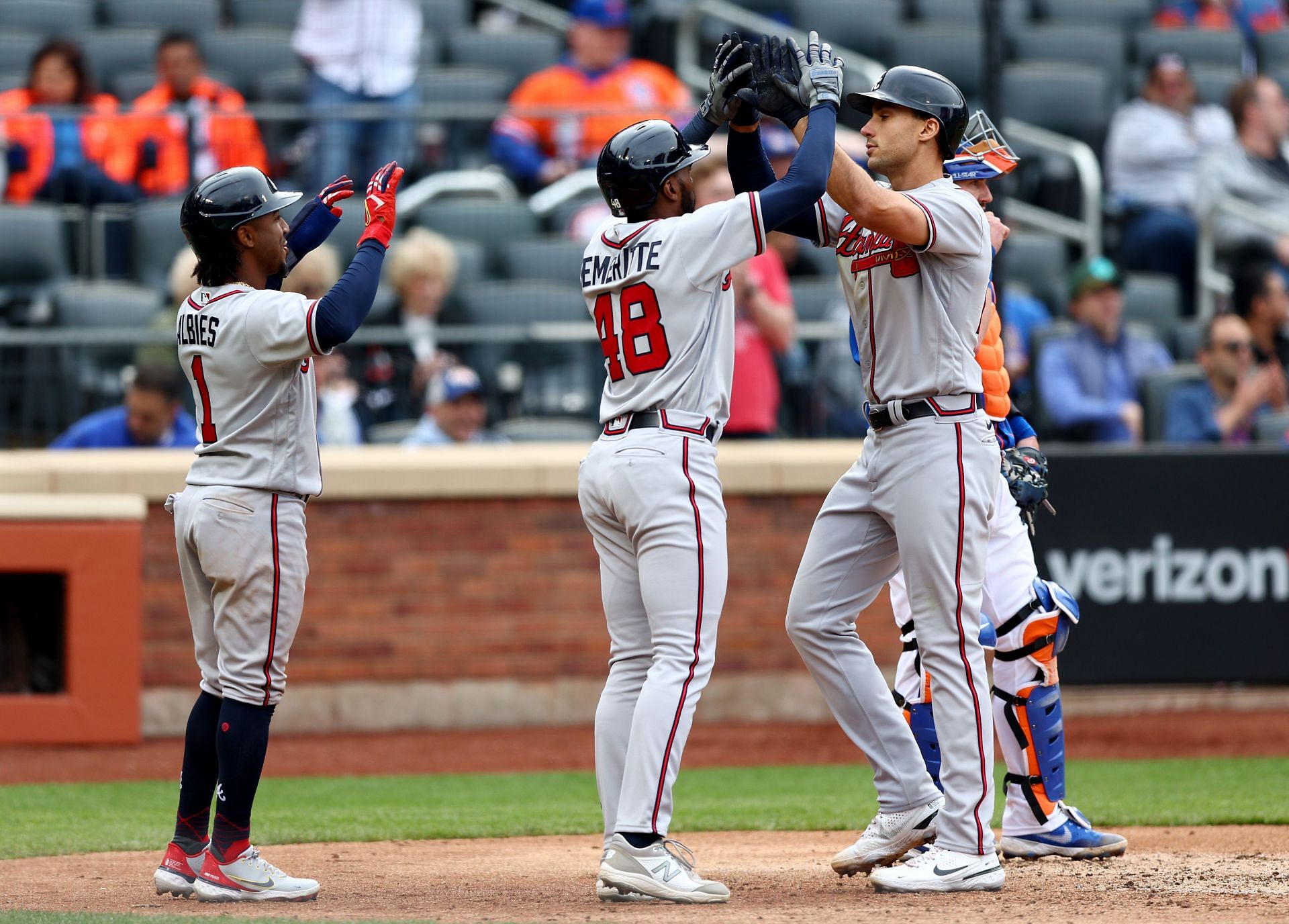 The Braves celebrate a three-run home run by Matt Olson. Atlanta Braves v New York Mets - Game One