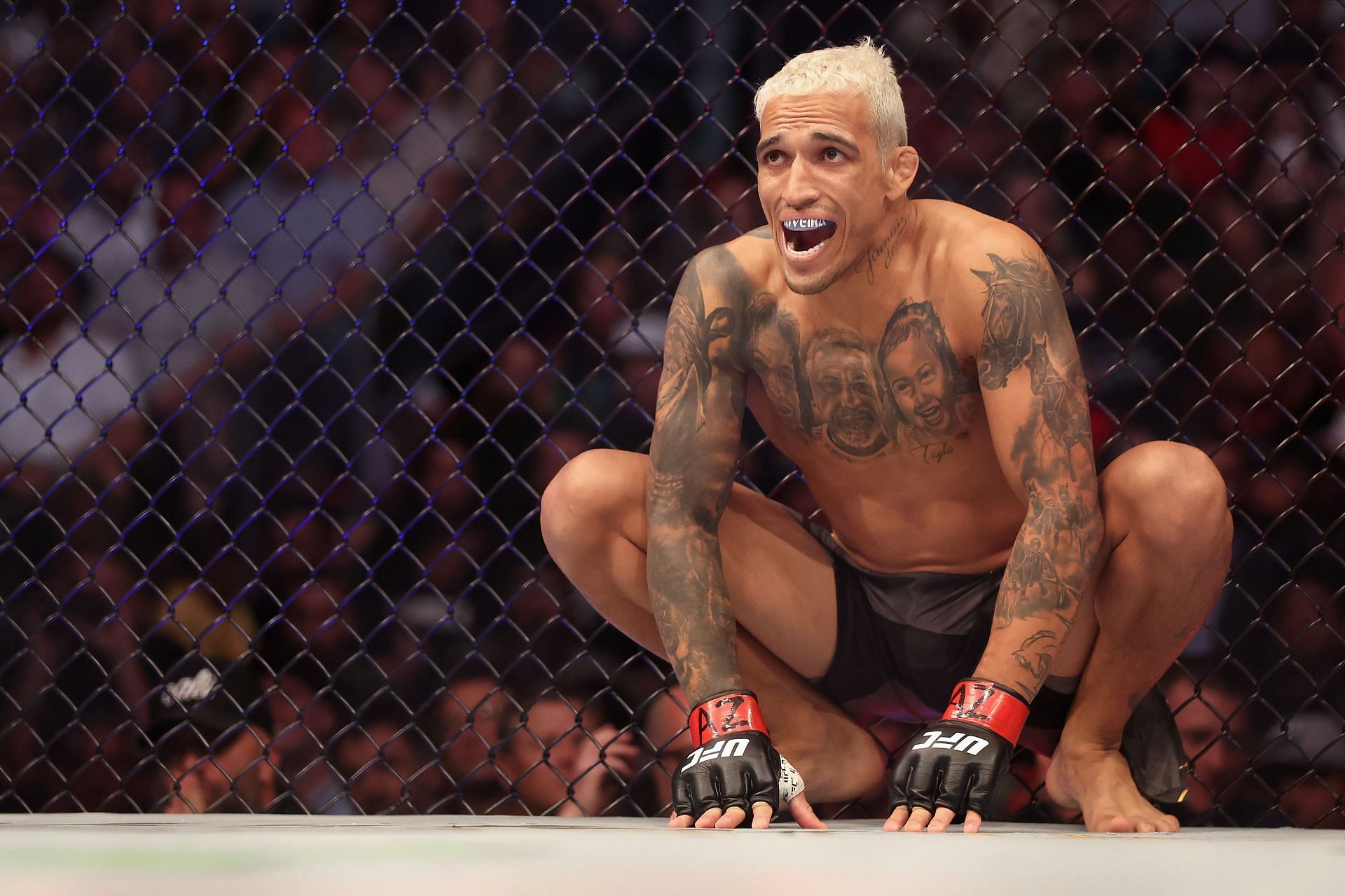 Charles Oliveira in the cage before his fight at UFC 274: Oliveira vs. Gaethje [Image courtesy of Getty]