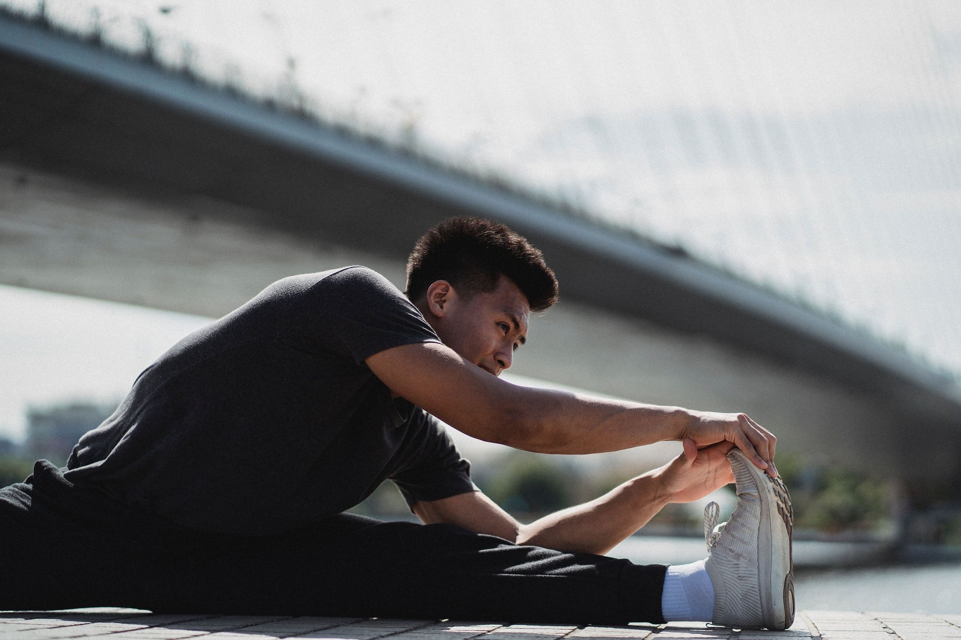 Activating your central nervous system is crucial for any weight training. (Image via Pexels / Allan Mas)