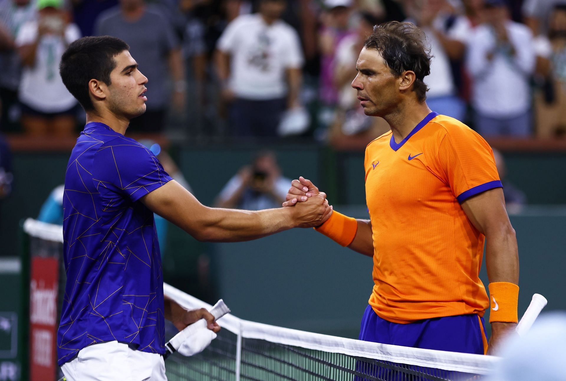 Carlos Alcaraz and Rafael Nadal shake hands after their match at the 2022 Indian Wells Masters