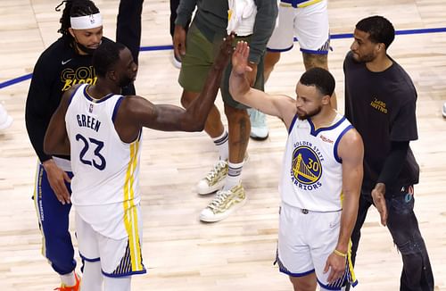 The Golden State Warriors celebrate a win in Game Three