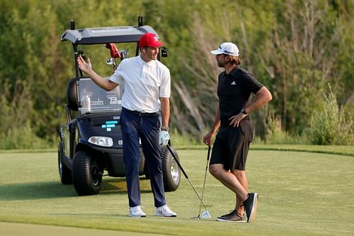 Tom Brady (left) and Aaron Rodgers at Capital One's The Match